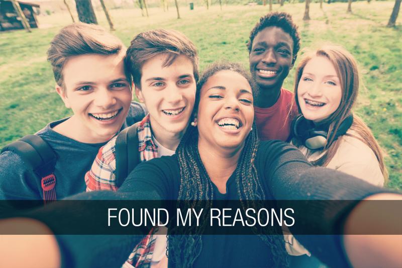 Group of fine teens crowd in to take a selfie. The text "found my reasons" runs along the bottom of the image in a banner.