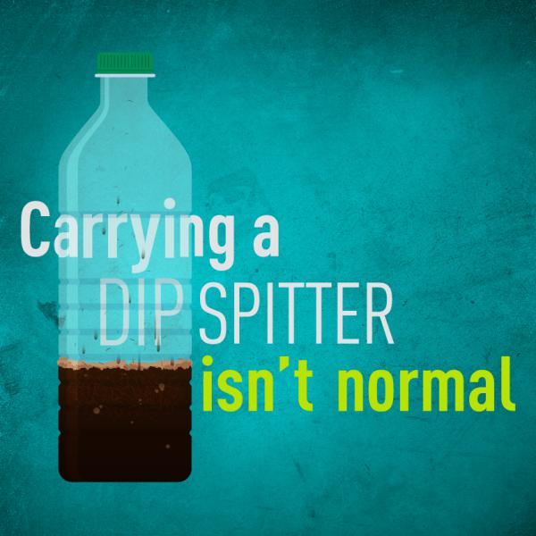 This is a bottle filled a third of the way up with a dark brown liquid. The text reads "Carrying a dip spitter isn't normal."