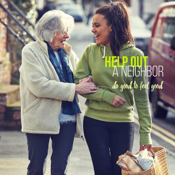 Older lady with her arm hooked though a younger girl's arm. They are looking at each other as they walk, and the girl is holding a basket of groceries for the woman. The text says, "Help out a neighbor. do good to feel good."