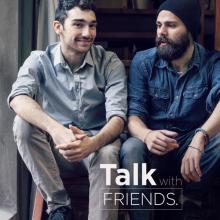 Two men sitting on some stairs, talking. Text reads, "Talk to friends."